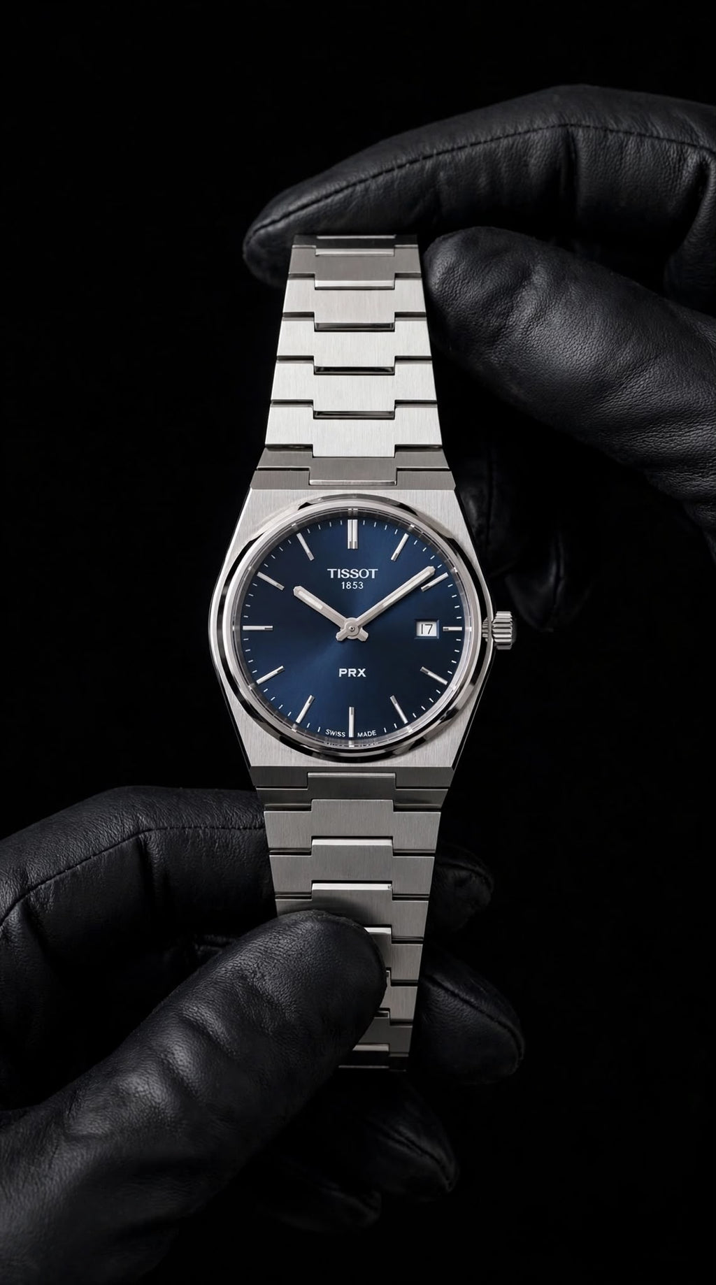 Tissot PRX mavi kadran ve metal bilezik tam ön görünüm